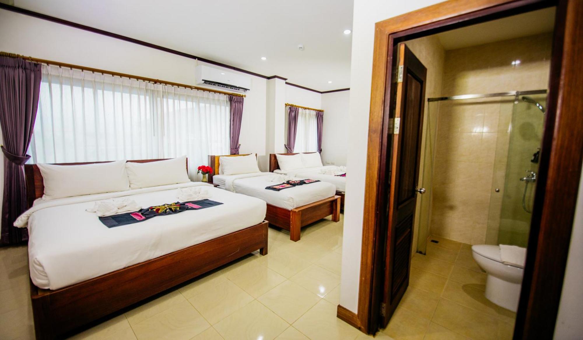 Sisombat Plaza Hotel Vang Vieng Extérieur photo